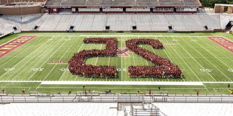 Class photo in Alumni Stadium